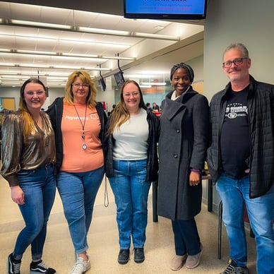 Five Payworks staff standing together after a blood donation.