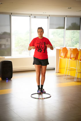 Buffy Handel leading the Hoop Dancing Workshop.