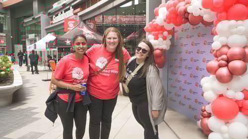Three United Way Sponsored Campaign Associates wearing United Way t-shirts.