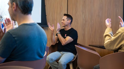 3.	Payworks’ President & CEO applauding a speaker in our Head Office lunchroom.