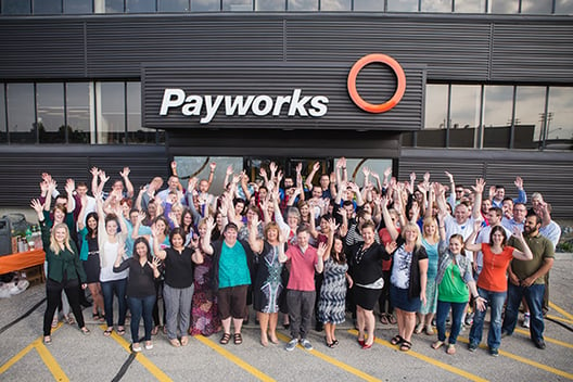 Group photo in front of the Payworks head office.