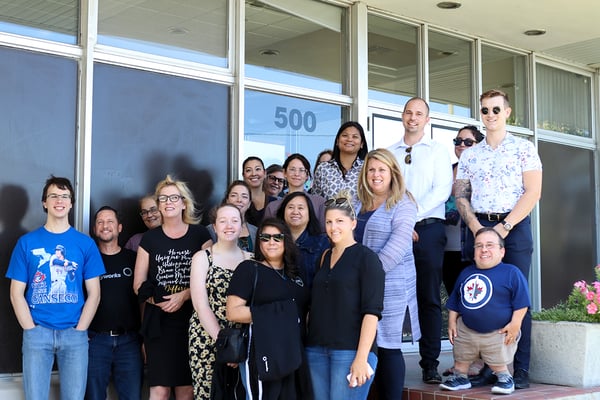 Group photo with 19 Payworks staff members.