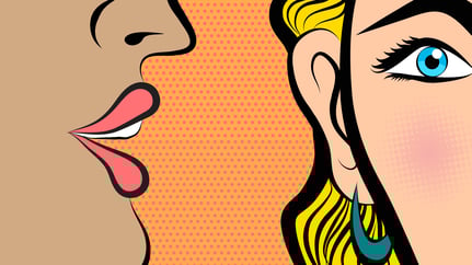 -	A cartoon image of a close-up on one person’s mouth speaking into the ear of someone on their right.