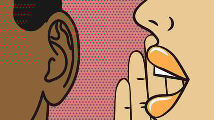 -	A cartoon image of a close-up on one person’s mouth speaking into the ear of someone on their left.