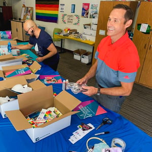 Payworks President and CEO JP Perron visited RRC to assist their team in assembling packages for Camp Aurora participants.