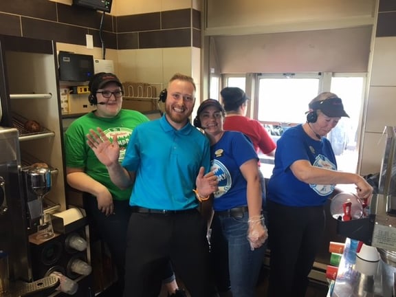 One Payworks staff working the Tim Hortons drive thru with two staff.