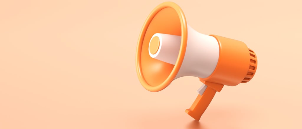 Alt text:  An orange megaphone accompanied by text that reads, “year-end legislation changes: top 3 things to keep in mind heading into 2024”.  