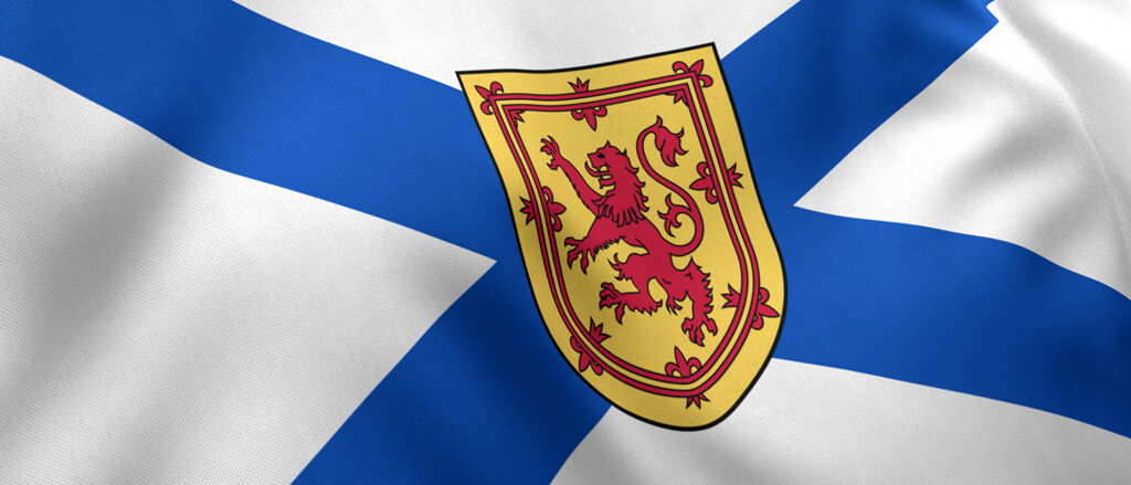 The Nova Scotia flag accompanied by text that reads, “A quick guide to Nova Scotia payroll legislation”.  