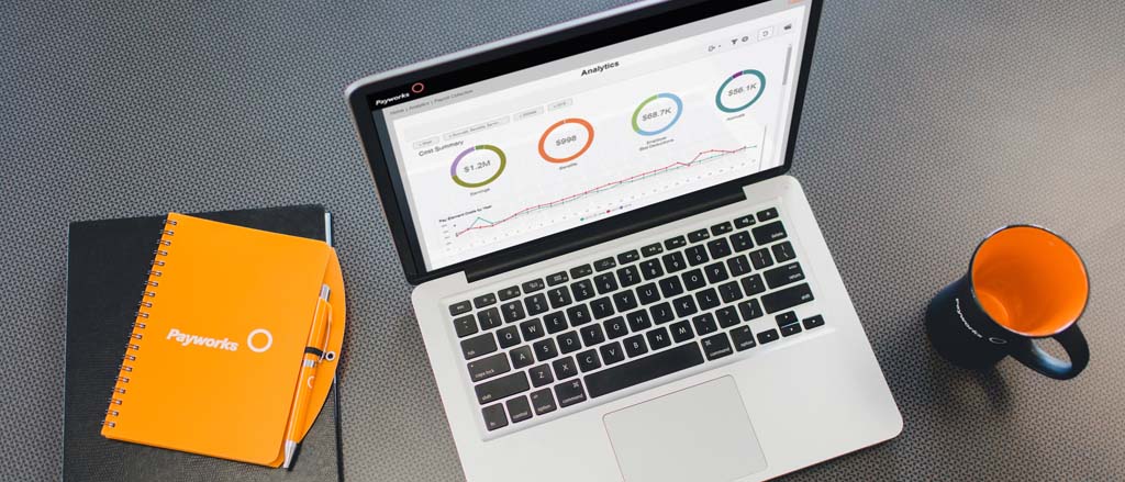 Text reads, “Workforce Analytics; Our top five ways to drill down into your payroll costs”.  
